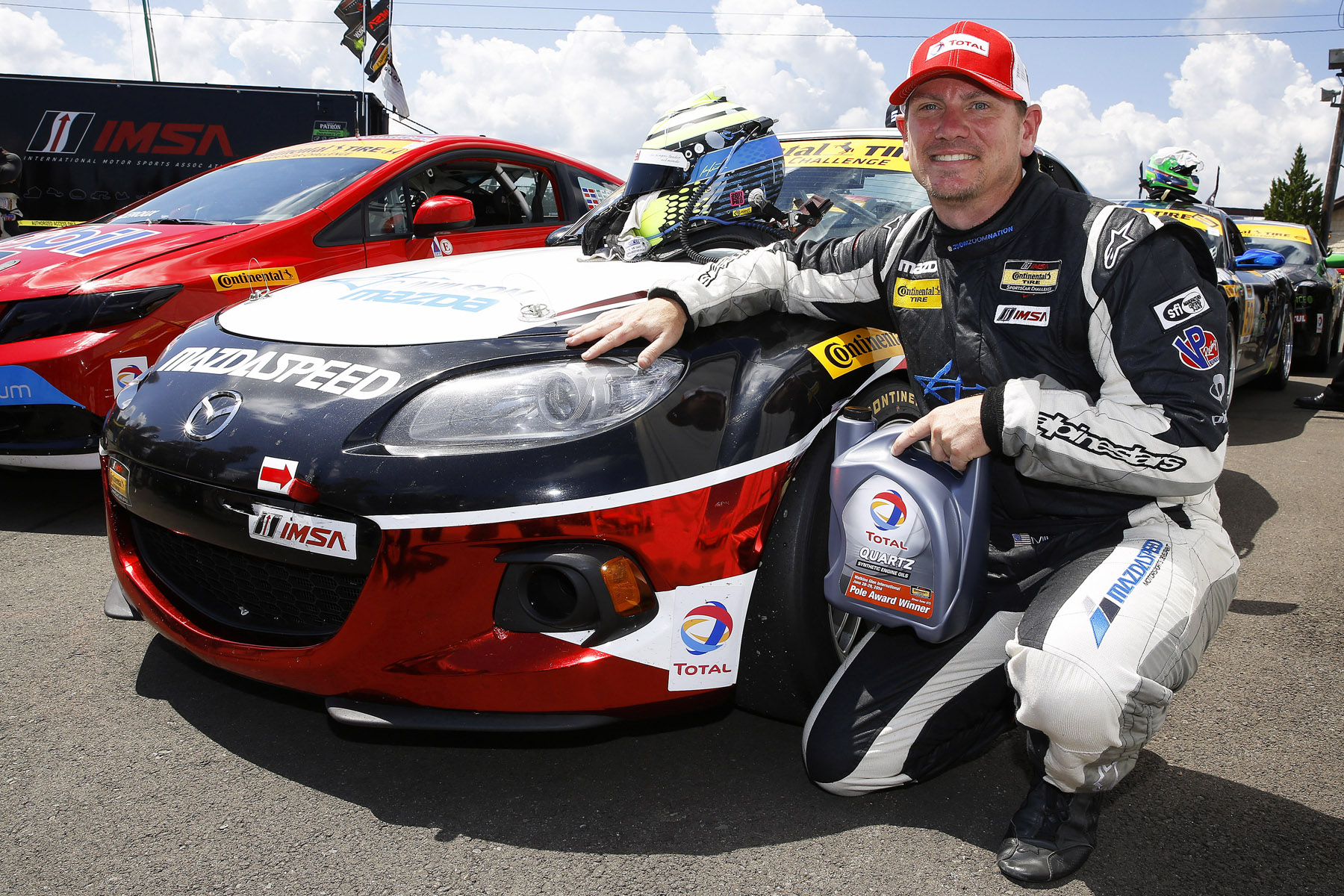RACER: Miller Scores Pole & Track Record at Watkins Glen